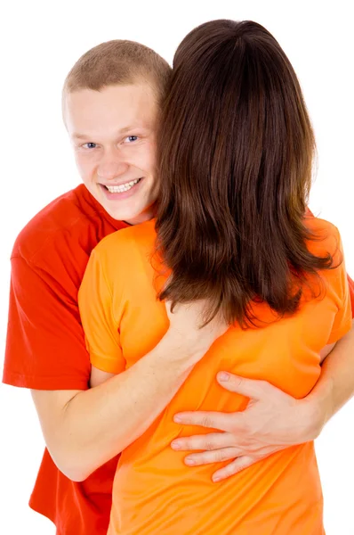 The handsome young man is hugging a girl — Stock Photo, Image