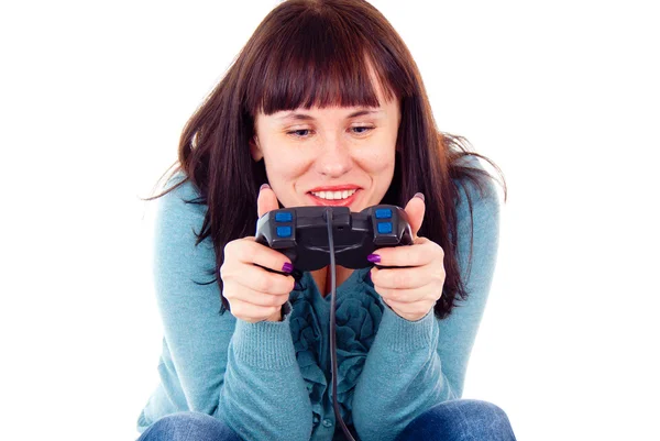 Девушка фанатично играет в видеоигру — стоковое фото