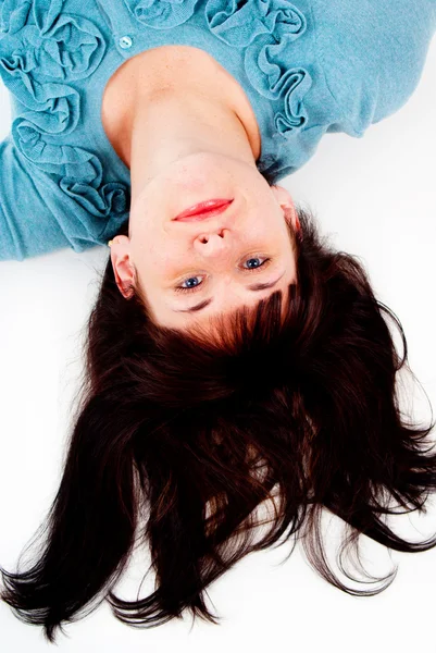 The girl poses while lying on the floor — Stock Photo, Image