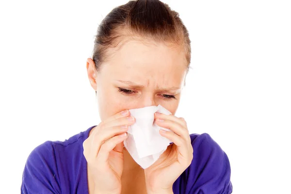 The sick girl sneezes — Stock Photo, Image