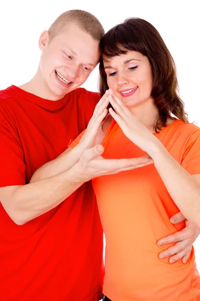 Een gelukkige familie, een paar van de show huis handen — Stockfoto