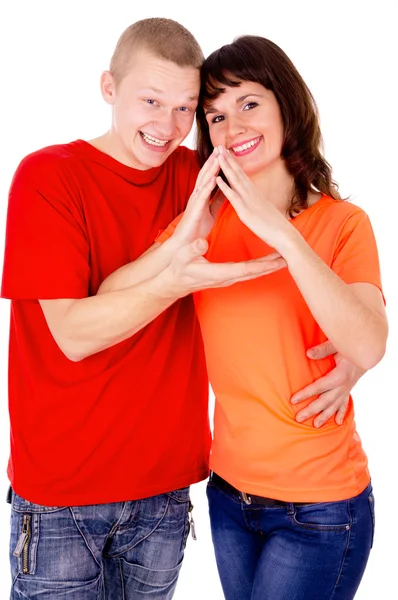 Een gelukkige familie, een paar van de show huis handen — Stockfoto