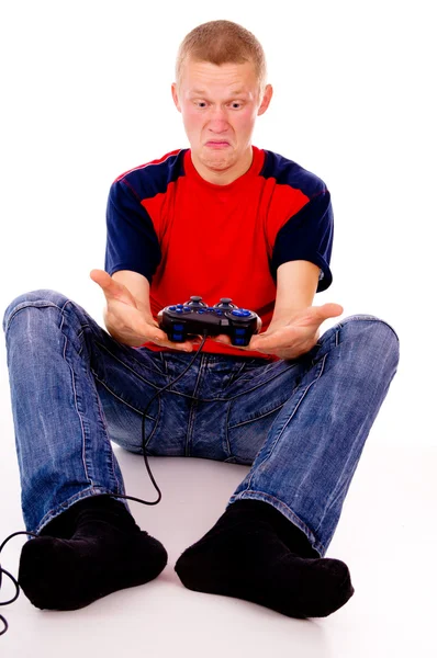 Beautiful guy, addicted to video games — Stock Photo, Image