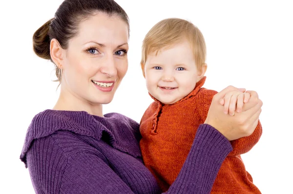 Moeder teder houden de baby in haar armen — Stockfoto