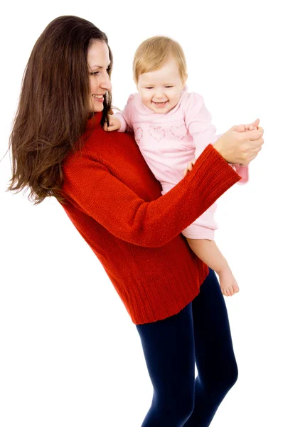 Madre se juega con un pequeño bebé, una familia feliz — Foto de Stock