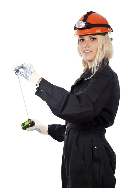 Builder of girl with roulette — Stock Photo, Image