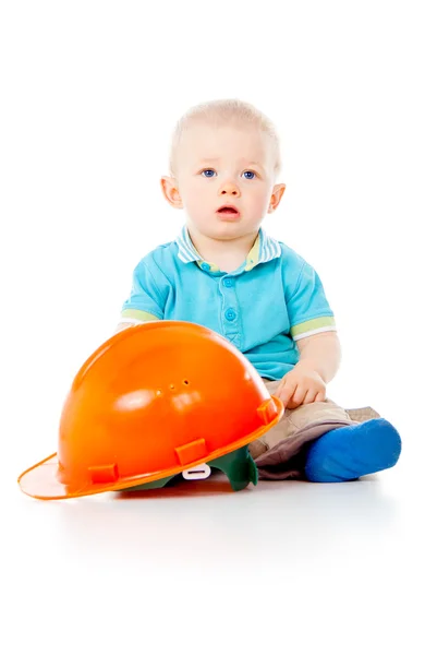 Criança com capacete de construção — Fotografia de Stock