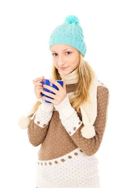 Girl in a cap with a mug — Stock Photo, Image