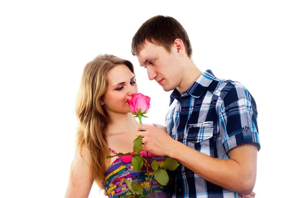 Chico da a una chica una rosa — Foto de Stock