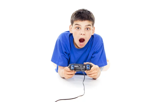 Junge spielt Computerspiele — Stockfoto