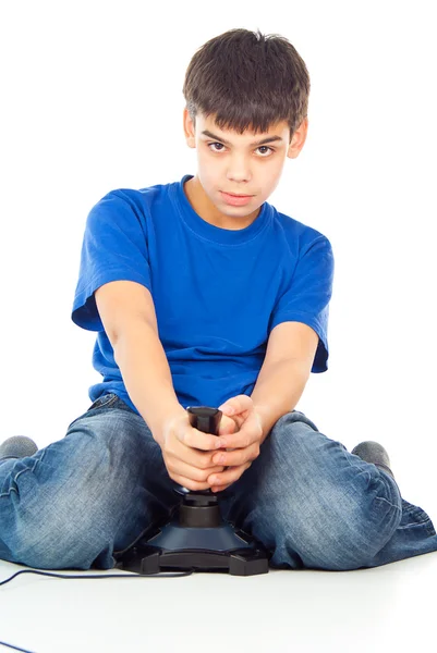 Boy plays with a joystick — Stock Photo, Image