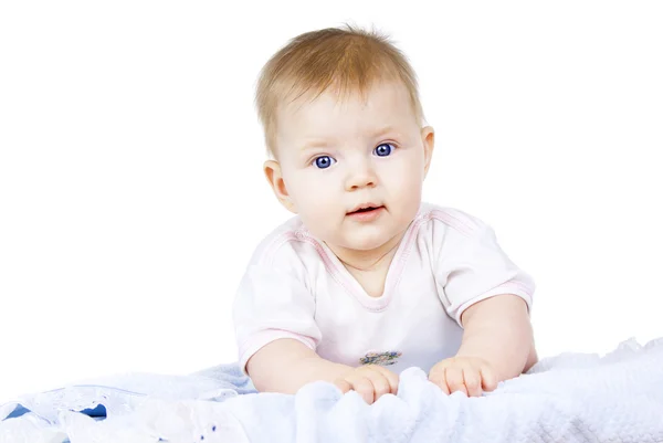 Happy baby lying isolated — Stock Photo, Image