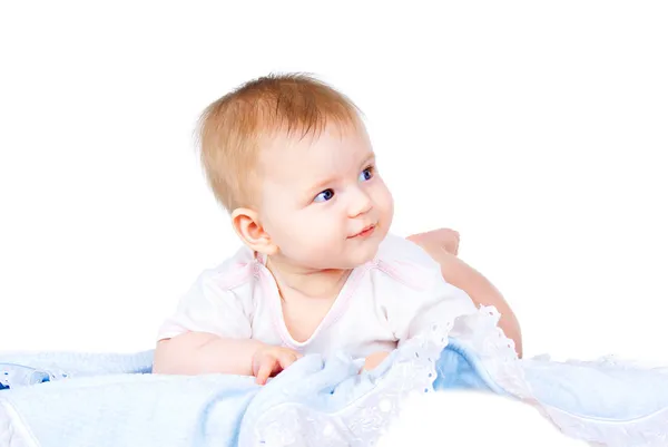 Bebé feliz en el pañal acostado —  Fotos de Stock