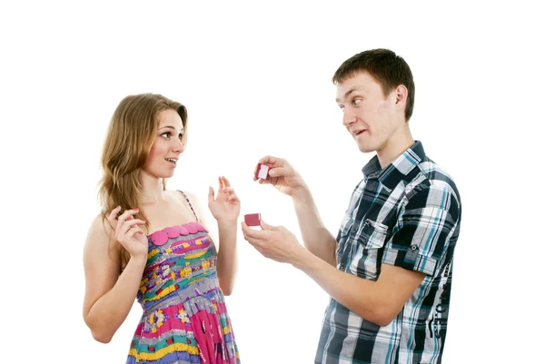 Happy guy makes a girl a gift — Stockfoto