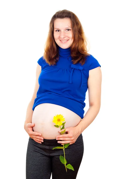 Heureuse fille enceinte tenant son estomac — Photo