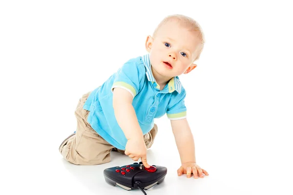 Küçük bir çocuk ve bir joystick — Stok fotoğraf