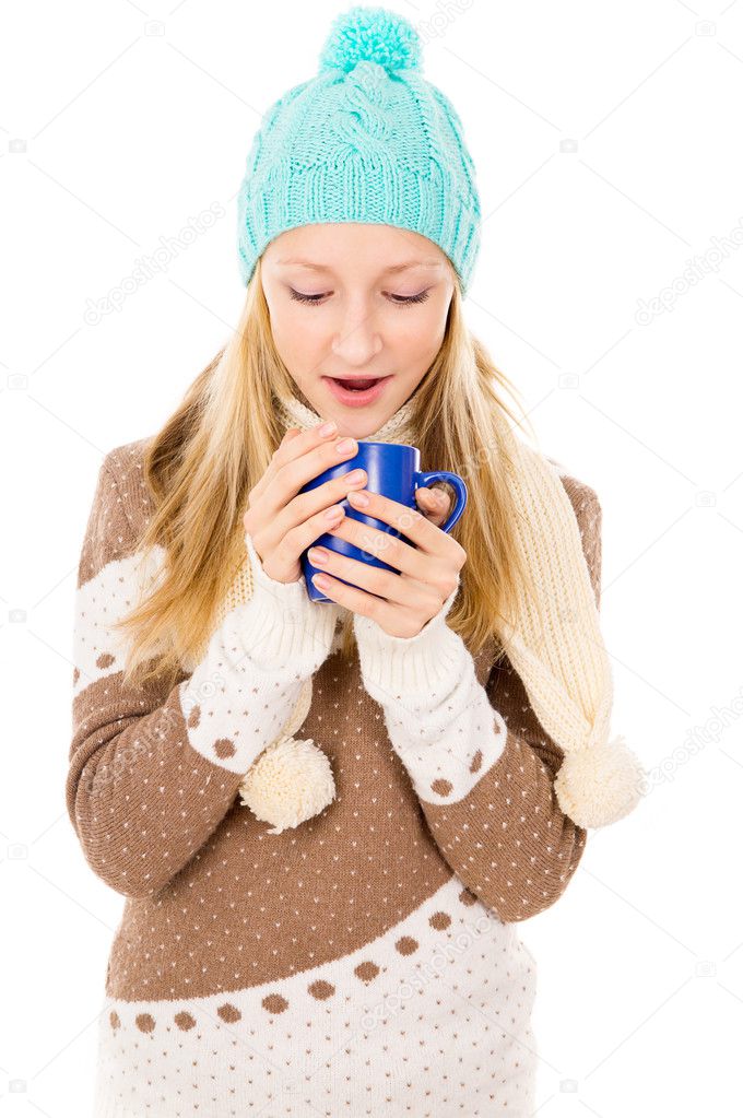 girl with a mug and a winter hat