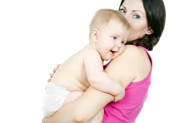 Anne kucağında bir bebek tutan — Stok fotoğraf