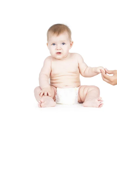 Naked child is in diapers — Stock Photo, Image