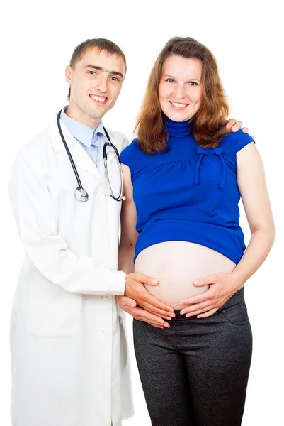 Médecin touche l'abdomen de la femme enceinte — Photo