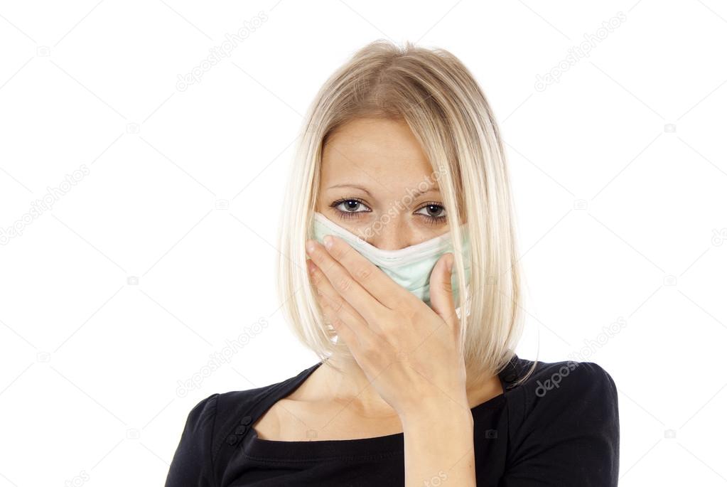 sick girl in a medical mask