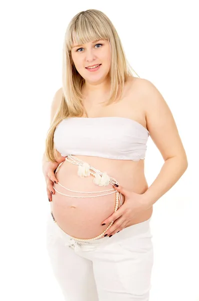 Pregnant girl with beads — Stock Photo, Image