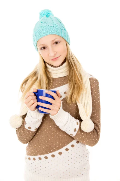 Teen girl in a cap with a mug — Stock Photo, Image