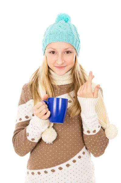 Teen girl in winter hat with cup isolated — Stock Photo, Image