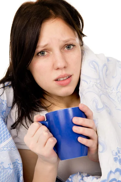 The diseased beautiful girl lying on the bed, and drink medicine — Stock Photo, Image