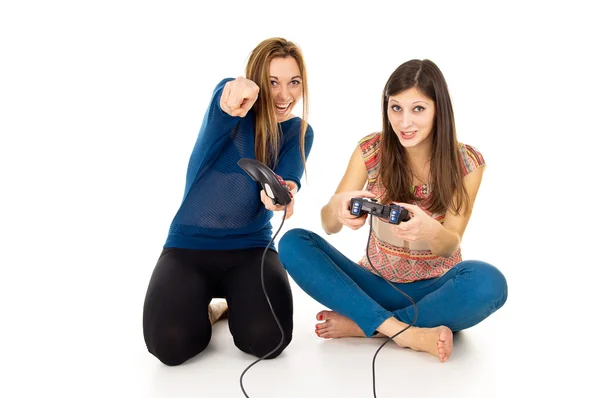 Two happy girls play video games — Stock Photo, Image