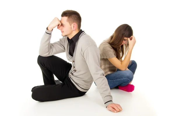 Menino e menina sentar triste — Fotografia de Stock