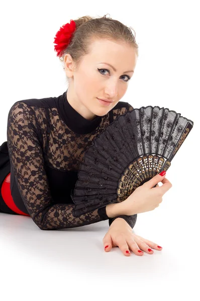 Carmen lying a girl with fan — Stock Photo, Image