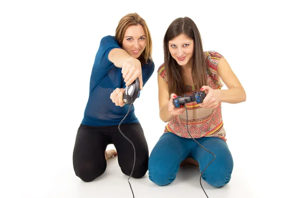 Friends play video games on the joysticks — Stock Photo, Image