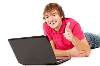 the beautiful guy works for laptop and points to you