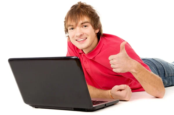 The beautiful guy works for laptop and displays OK — Stock Photo, Image