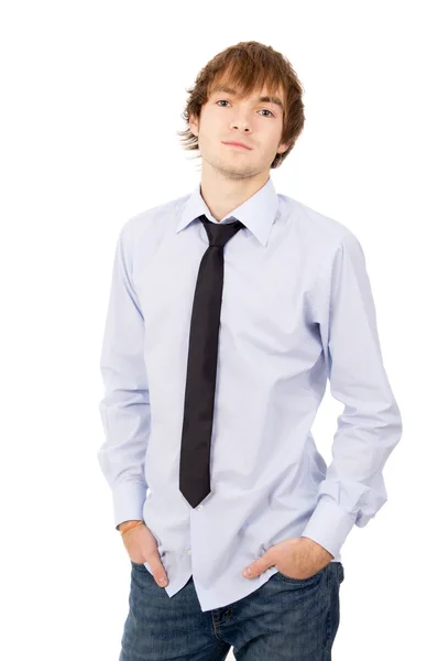 The handsome young man posing in front of the camera, in a shirt — Stock Photo, Image