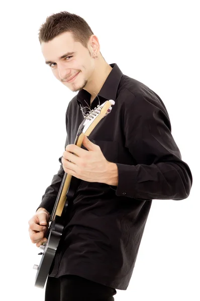 Young guy is playing the guitar — Stock Photo, Image