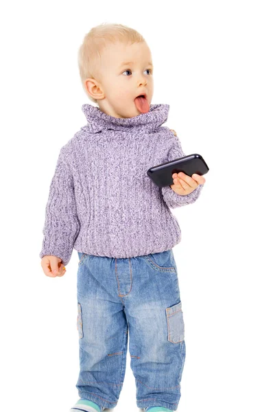 Un bambino tenere un telefono cellulare — Foto Stock