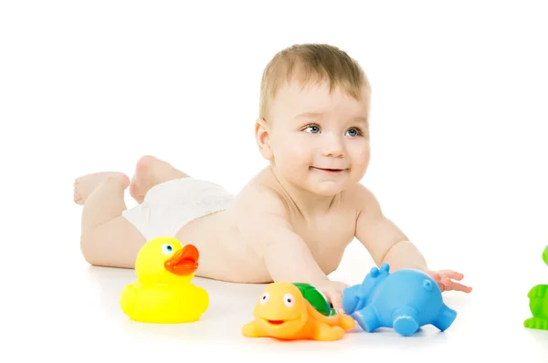 A little kid playing with toys — Stock Photo, Image