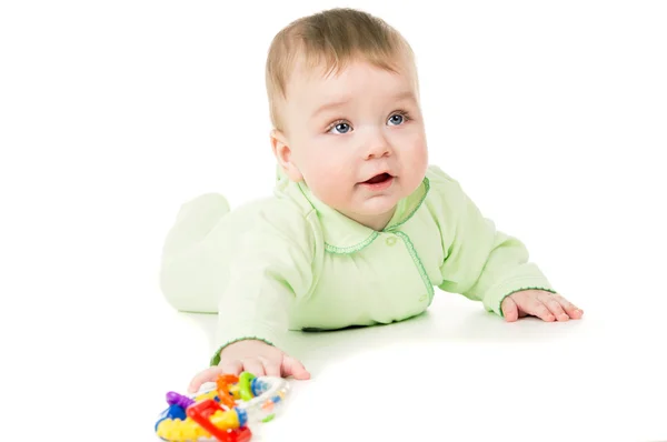 Beautiful a little kid playing with toys — Stock Photo, Image