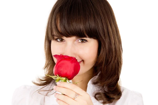 Bella ragazza annusare il profumo della rosa — Foto Stock