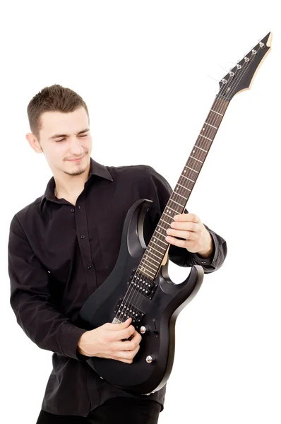 Beautiful guy is playing the guitar — Stock Photo, Image