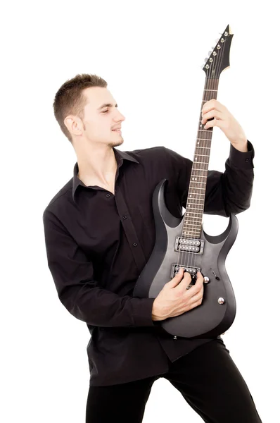 Beautiful guy is playing the guitar — Stock Photo, Image