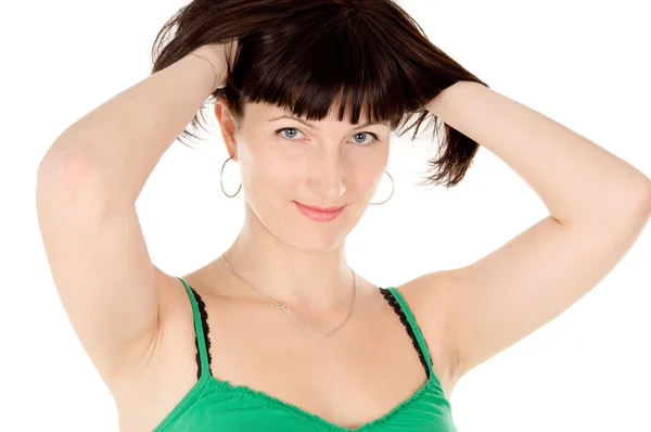 Hermosa mujer posando delante de la cámara, sostenga el cabello — Foto de Stock