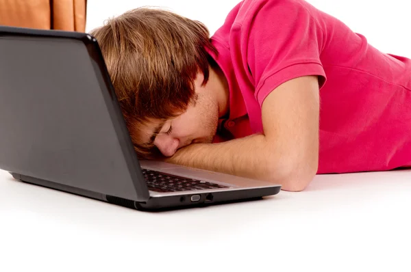 Killen student somnade för en bärbar dator — Stockfoto