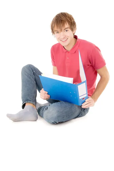 Guy student zitten en lezen van de documenten Rechtenvrije Stockfoto's