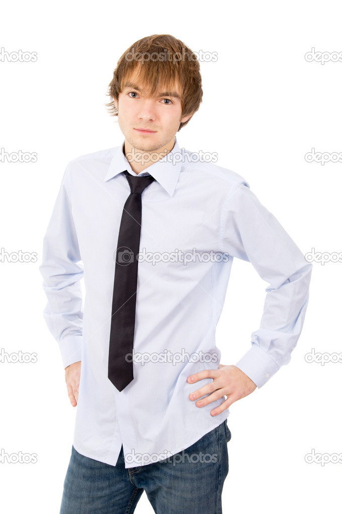 beautiful young man posing in front of the camera, in a shirt an