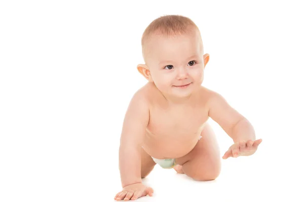 Un pequeño bebé arrastrándose por el suelo — Foto de Stock