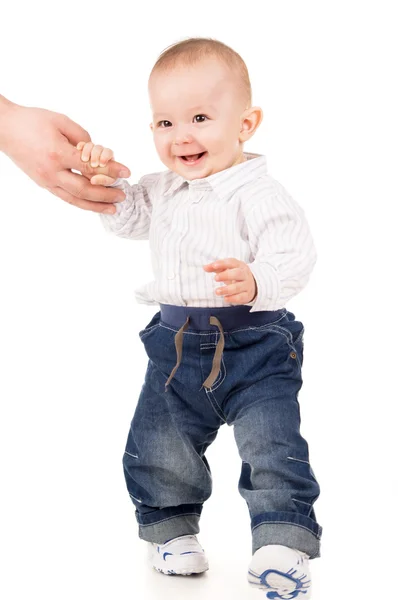 Boy in clothes makes first steps — Stock Photo, Image