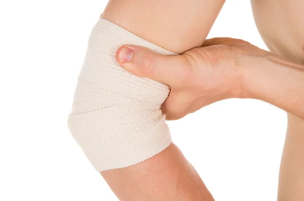 Bandażowanie łokcia z bandaż elastyczny — Zdjęcie stockowe